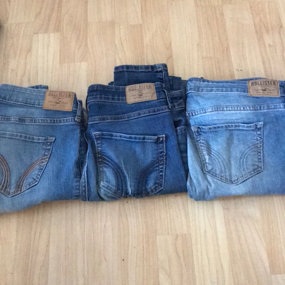 Three pairs of Hollister jeans